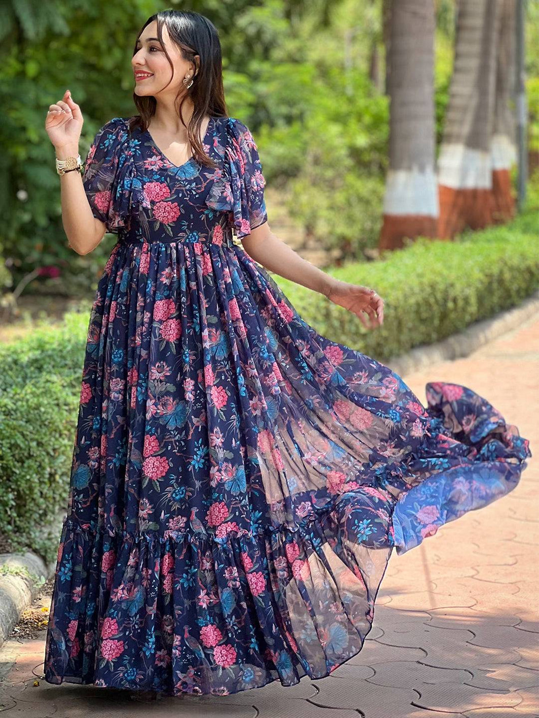 Midnight Navy Floral V-Neck Dress flowing in garden