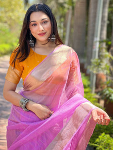 Purple organza saree with gold zari border, worn by model