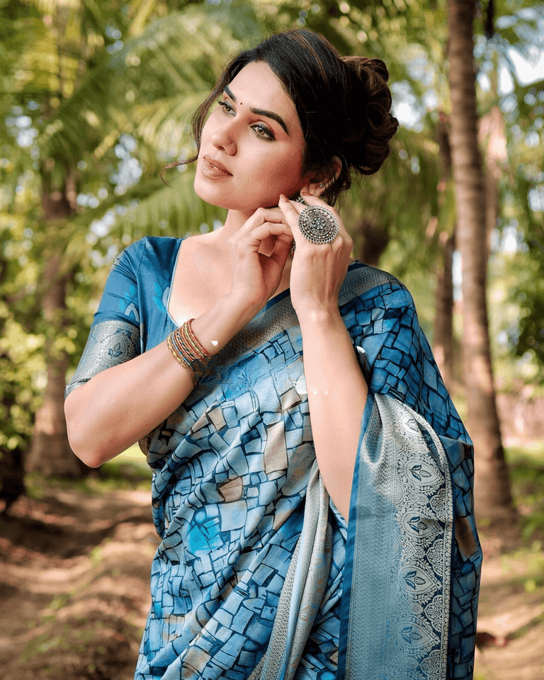 Dazzling Blue Colored Jacquard Silk Saree With Zari Border Blouse