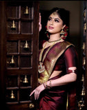 Imposing Brown Colored Kanchivaram Silk Saree